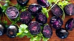 The Purple Tomato has deep purple flesh. Traditional breeders have grown tomatoes with purple skin before but not with this tone in the flesh.