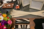 Belts. jewelry, and clutches on a table at Garnish, a womenswear boutique featuring founder Erica's Lurie's designs, during the store's twentieth anniversary party on July 27, 2024. 