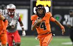 Oregon State quarterback Gevani McCoy (4) rushes for his second touchdown against UNLV during the first half of an NCAA college football game Saturday, Oct. 19, 2024, in Corvallis, Ore.