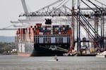 A cargo ship sits in a New Jersey port along New York Harbor on April 19, 2023.