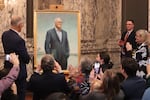 Washington's 23rd governor, Jay Inslee, admires his official portrait after its unveiling Tuesday, Jan. 14, 2025. The portrait was painted by Seattle artist Grace Athena Flott, and will hang in the governor's office to memorialize Inslee's tenure in the role.