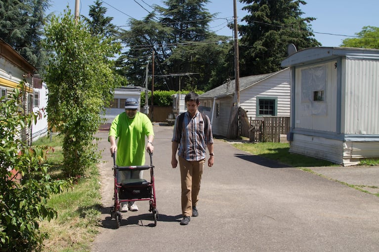 Resident Victor Johanson with Cameron Herrington, an anti-displacement advocate with Living Cully. 