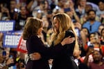 Beyonce, right, and Vice President Kamala Harris embrace on stage during a campaign rally Friday in Houston.