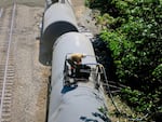 Cleanup efforts continued on Monday, June 6, 2016, at the site of an oil train derailment in Mosier, Oregon.