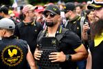 FILE - In this Aug. 17, 2019, file photo, Proud Boys chairman Enrique Tarrio rallies in Portland, Ore. Outside pressures and internal strife are roiling two far-right extremist groups after members were charged in the attack on the U.S. Capitol. Former President Donald Trump’s lies about a stolen 2020 election united an array of right-wing supporters, conspiracy theorists and militants on Jan. 6.