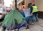 FILE: Rapid Response Bio-Clean teams perform campsite removals in Portland’s Old Town Chinatown, March 9, 2025. Oregon invested in statewide shelters but slashed money for eviction prevention programs. 