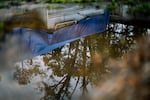 Climate change causes tens of billions of dollars in economic damage in the United States every year, according to a new assessment. Many survivors of climate-driven disasters, including hurricanes, floods and wildfires, struggle for months or even years to repair their homes or find new stable housing. Here, a Louisiana home damaged by a hurricane sits waiting for unaffordable repairs.