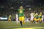 Oregon offensive lineman Gernorris Wilson (91) celebrates his touchdown reception during an NCAA college football game against Maryland, Saturday, Nov. 9, 2024, in Eugene, Ore.