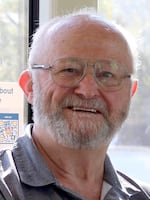Greg Peterson, of Portland, riding the MAX Green Line, Aug. 26, 2026.
