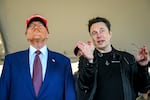 President-elect Donald Trump listens to Elon Musk as he arrives to watch SpaceX's mega rocket Starship lift off for a test flight from Starbase in Boca Chica, Texas, on Nov. 19.