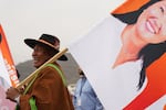 A supporters hols a banner of presidential candidate Keiko Fujimori during her closing campaign rally in Lima, Peru, Thursday.