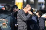 Family members of the passengers on a plane which burst into flames, weep at the Muan International Airport in Muan, South Korea, on Sunday.