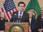 FILE - Washington Gov. Bob Ferguson answered questions from reporters about his savings plans at a news conference Thursday, Feb. 27, 2025. On April 17, 2025, Ferguson criticized Washington Democrats' revised tax proposals as unsustainable amid federal threats, urging caution and budget changes while lawmakers scramble to finalize a deal before session ends.