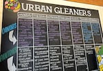 A large chalkboard at the Urban Gleaners headquarters in Portland, Ore., May 22, 2023. Urban Gleaners hosts 38 different Free Food Markets around the metro area.