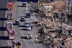 Homes along the Pacific Coast Highway are seen burned by the Palisades Fire, Sunday, Jan. 12, 2025, in Malibu, Calif. (AP Photo/Mark J. Terrill)