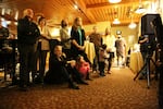 A crowd listens to Josh Horner's story at a fundraiser for the Oregon Innocence Project in Bend on Dec. 6, 2018. 