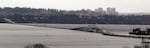 FiLE - Traffic moves across the Highway 520 floating bridge in front of downtown Bellevue, Wash., on Wednesday, Dec. 28, 2011, from Seattle.