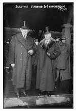 Sens. Warren G. Harding, left, and George E. Chamberlain in New York in January 1919.