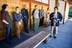 Portland Japanese Garden curator Sadafumi Uchiyama, right, takes a group of visitors on a tour of the Portland Japanese Garden.