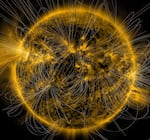 A depiction of the Sun’s magnetic fields is overlaid on an image of the Sun captured in extreme ultraviolet light by NASA’s Solar Dynamics Observatory on March 12, 2016.