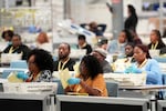 Election workers process mail-in ballots for the 2024 General Election at the Philadelphia Election Warehouse, Tuesday, Nov. 5, 2024, in Philadelphia.