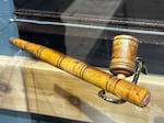 An antique wooden pipe on display at CTCLUSI's tribal headquarters in Coos Bay. Tribes want items such as these in state agencies, and public colleges and universities accounted for, and the Task Force on Oregon Tribal Cultural Items is seen as an important part of that initiative.