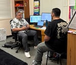 Class of 2025 student Logan talks with his counselor, Nick Fuimaono, in Fuimaono’s office at McKay. Logan had to submit an application and work with his counselor in order to use his work experience for elective credits.