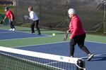 Several people play pickleball on Feb. 10, 2023 at Tanner Creek Park in West Linn, Ore. 