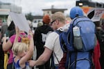 Portland resident Mike Matheny with his daughter, left, and son, right, at the Vancouver blockade.