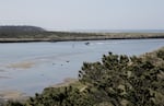 The Yaquina Bay Lighthouse has sweeping views of the channel into Newport harbor and the ocean.