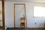 During the occupation, intruders broke into one residence and let themselves into the dining hall at the field station. This broken door was the only visible damage from their visit.