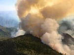 The Chetco Bar Fire remained relatively quiet for its first month before exploding into Oregon's largest wildfire.