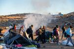 U.S. Customs and Border Protection has corralled would-be asylum seekers into what locals are calling open-air detention camps (OADs) in and around Jacumba, Calif. Above, migrants appear inside one of the camps on Jan. 12.