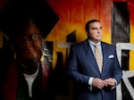 Michael McMillan, the president and CEO of Urban League St. Louis, stands in front of a painting of Michael Brown Jr. on Tuesday, Aug. 6, 2024, at the Ferguson Empowerment Center in Ferguson. The Urban League and Salvation Army built the community center at the site where a QuickTrip burned down in 2014 after the police killing of Brown Jr.