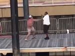 A screenshot from one of the videos of the brawl in Montgomery, Ala., on Saturday. The video shows a fight that broke out between an apparent dock worker and several men who appeared to be parking their pontoon boat in a space reserved for the city's riverboat.