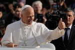 Pope Leo XIV greets faithful as he arrives in St. Peter's Square on the occasion of the last Jubilee audience, at the Vatican, on Saturday.