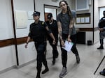 WNBA star Brittney Griner leaves a courtroom after the court's verdict in Khimki outside Moscow, on August 4, 2022.