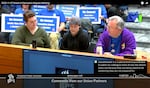 In this screenshot from a video feed, representatives from the Portland Federation of School Professionals and SEIU unions speak at the Portland Public Schools Board of Education meeting on Nov. 7, 2023, at the district office in Portland. PFSP president Elizabeth Held, left, spoke first. Chris Walters, an SEIU bargaining team member, right, spoke later.