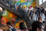 Students walk past a mural between classes at the newly rebuilt Beaverton High School on the first day of the 2026-2027 school year in Beaverton, Ore., on Aug. 26, 2026.