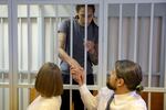 Brittney Griner shakes hands with her lawyer, Alexander Boykov, next to the U.S. Embassy's Deputy Chief of Mission Elizabeth Rood, before a court hearing in Khimki on Aug. 4.