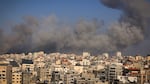 Smoke billows during Israeli airstrikes in Gaza City on Thursday.