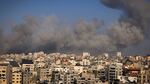 Smoke billows during Israeli airstrikes in Gaza City on Thursday.