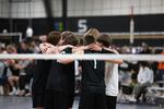 The Summit High School Boys Volleyball team circles up during the 2024 Boys Volleyball State Championship at Olympus Sports Center in Hillsboro, Ore., on June 1, 2024.