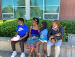 Class of 2025 student Josh (left) with his family, including mother Sharnissa Secrett (2nd from left) at Ron Russell Middle School on June 17, 2021.