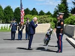 President Biden pays tribute to fallen U.S. soldiers of World War I in a wreath-laying ceremony at the Aisne-Marne American Cemetery in Belleau, France, on June 9.