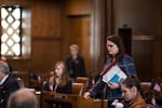 State Sen. Sara Gelser takes her seat in the Senate chamber at the Capitol in Salem, Ore., Tuesday, April 2, 2019. Gelser introduced language in a measure Tuesday to require the state Department of Human Services to present a plan to minimize out-of-state placement for children in foster care.