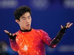 Nathan Chen competes in the men's free skate program during the figure skating event at the 2022 Winter Olympics, Thursday, Feb. 10, 2022, in Beijing. The U.S. team will finally be awarded its long-delayed gold medal at a ceremony on Paris.
