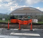 Hail and wind from a severe thunderstorm on Aug. 11, 2022, downed trees in front of Wallowa High School in Wallowa, Oregon.