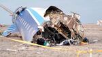 In this photo taken from a video released by the administration of Mangystau region, the wreckage of Azerbaijan Airlines Embraer 190 lies on the ground near the airport of Aktau, Kazakhstan, on Wednesday.