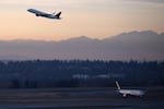 A plane takes off on Monday, December 11, 2017, at Seattle-Tacoma International Airport.
